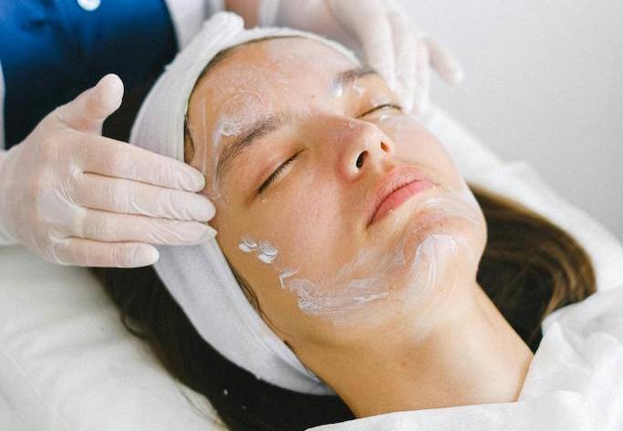 patient receiving a facial treatment