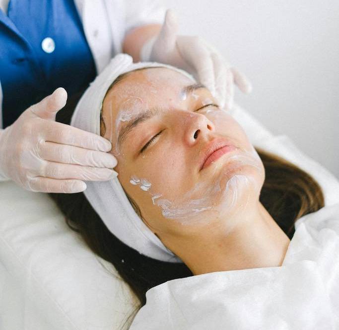 patient receiving a facial treatment